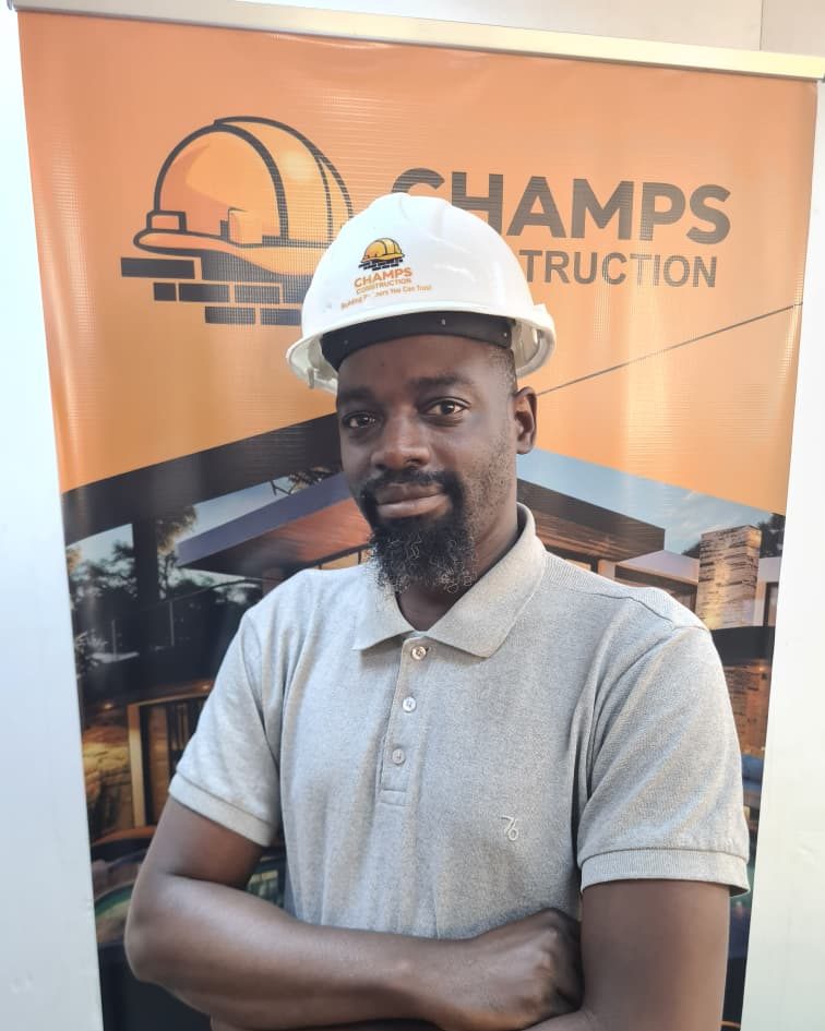 Mr D. Chaleka in a Champs hard hat