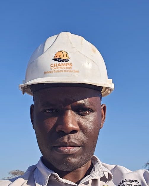 Mr R. Gwenyambira in a Champs hard hat